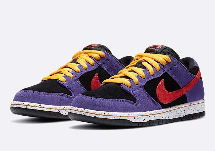 Purple, black, red, and yellow Nike Dunk shoes.